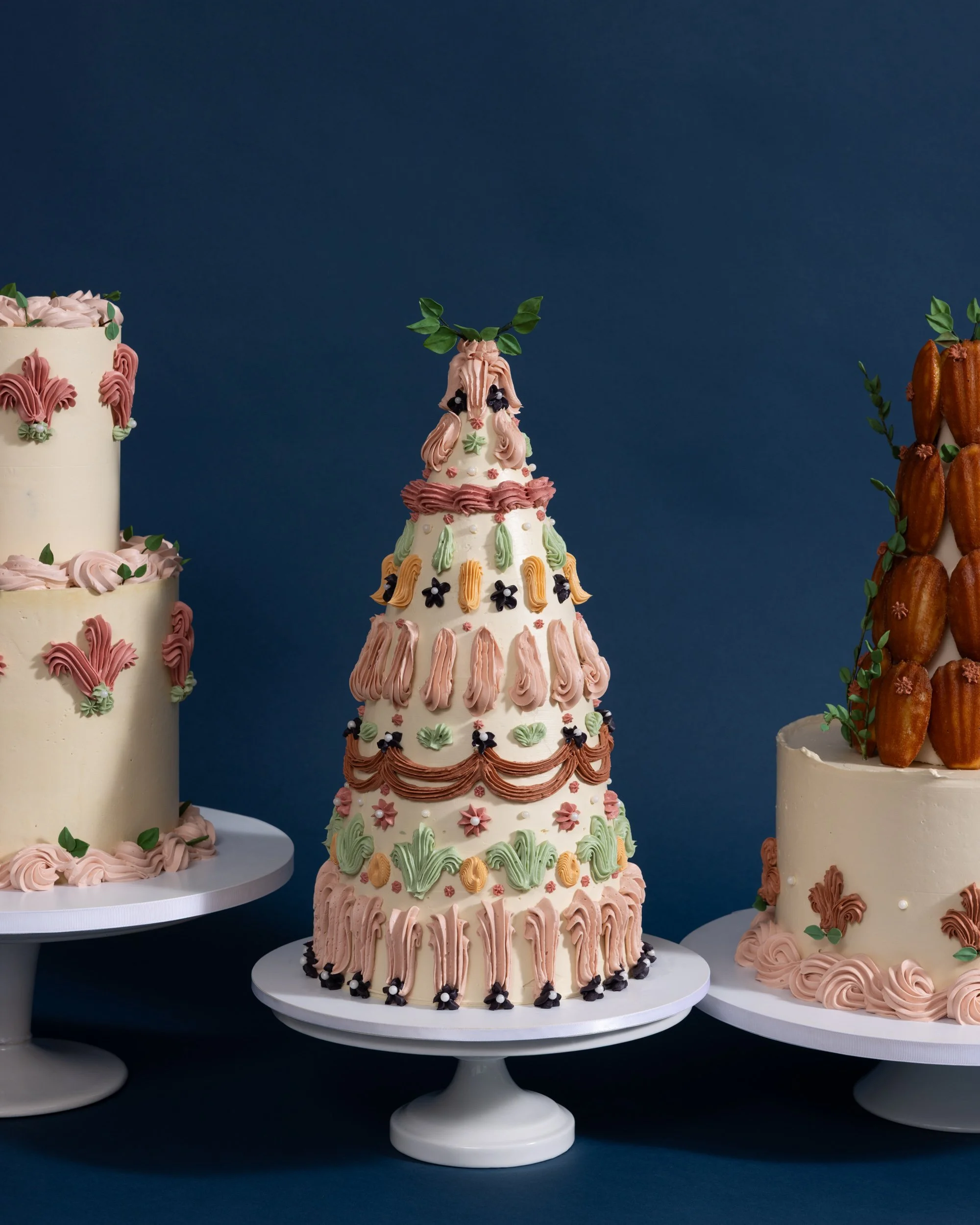 Three Buttercream Cakes with Romantic Piping and Madeleine Tower