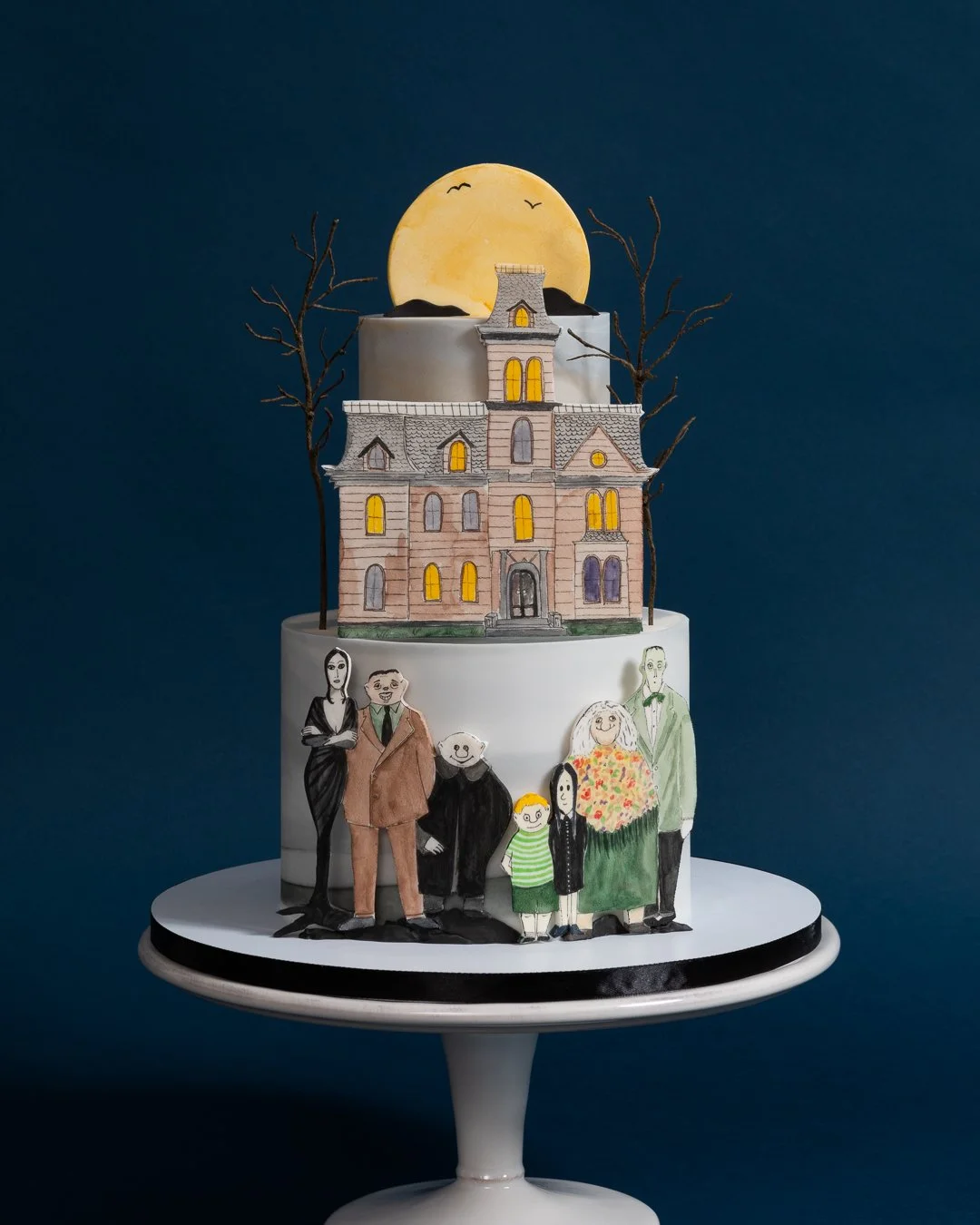Addams Family halloween cake with moon and house 