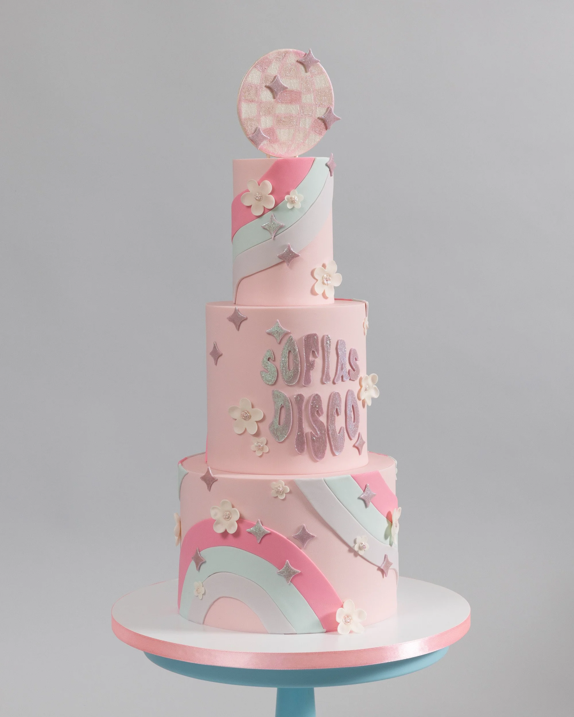 Pink feminine 70s disco birthday cake