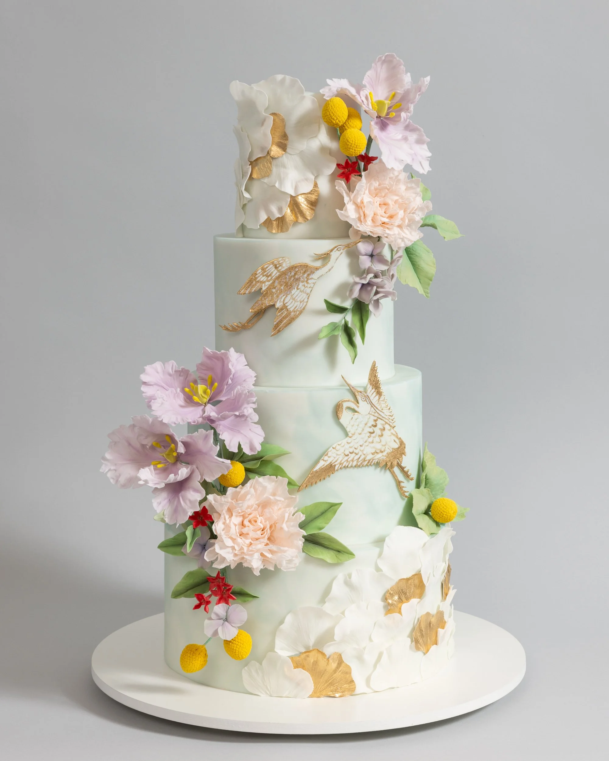 Pale Green Wedding Cake with Golden Cranes and Gingko Leaves and Lavender Tulips