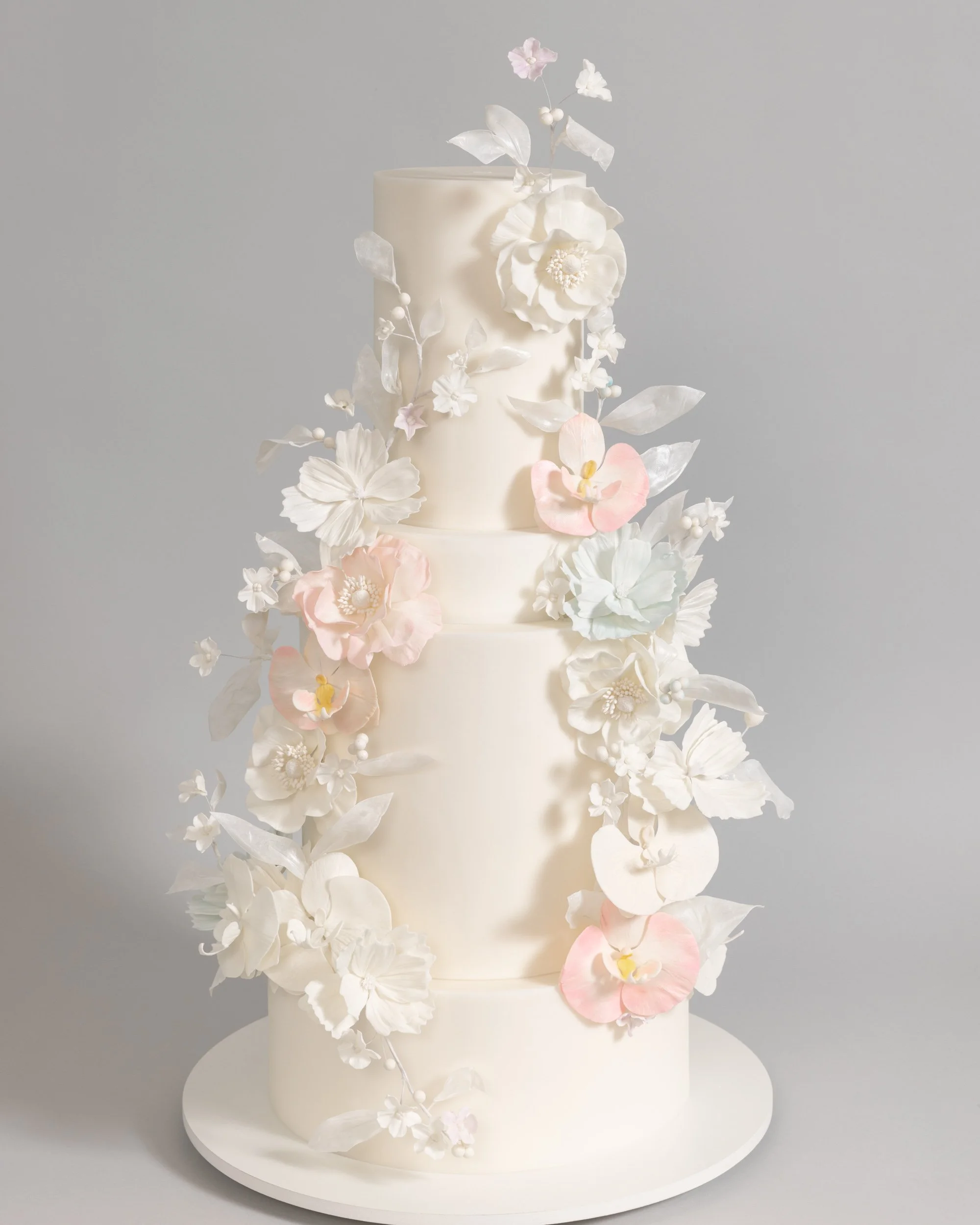 Iridescent Sugar Flowers on White Five Tier Wedding Cake