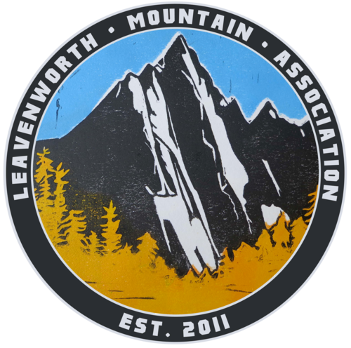 Logo of the Leavenworth Mountain Association featuring a mountain peak, pine trees, and the organization name around the circle