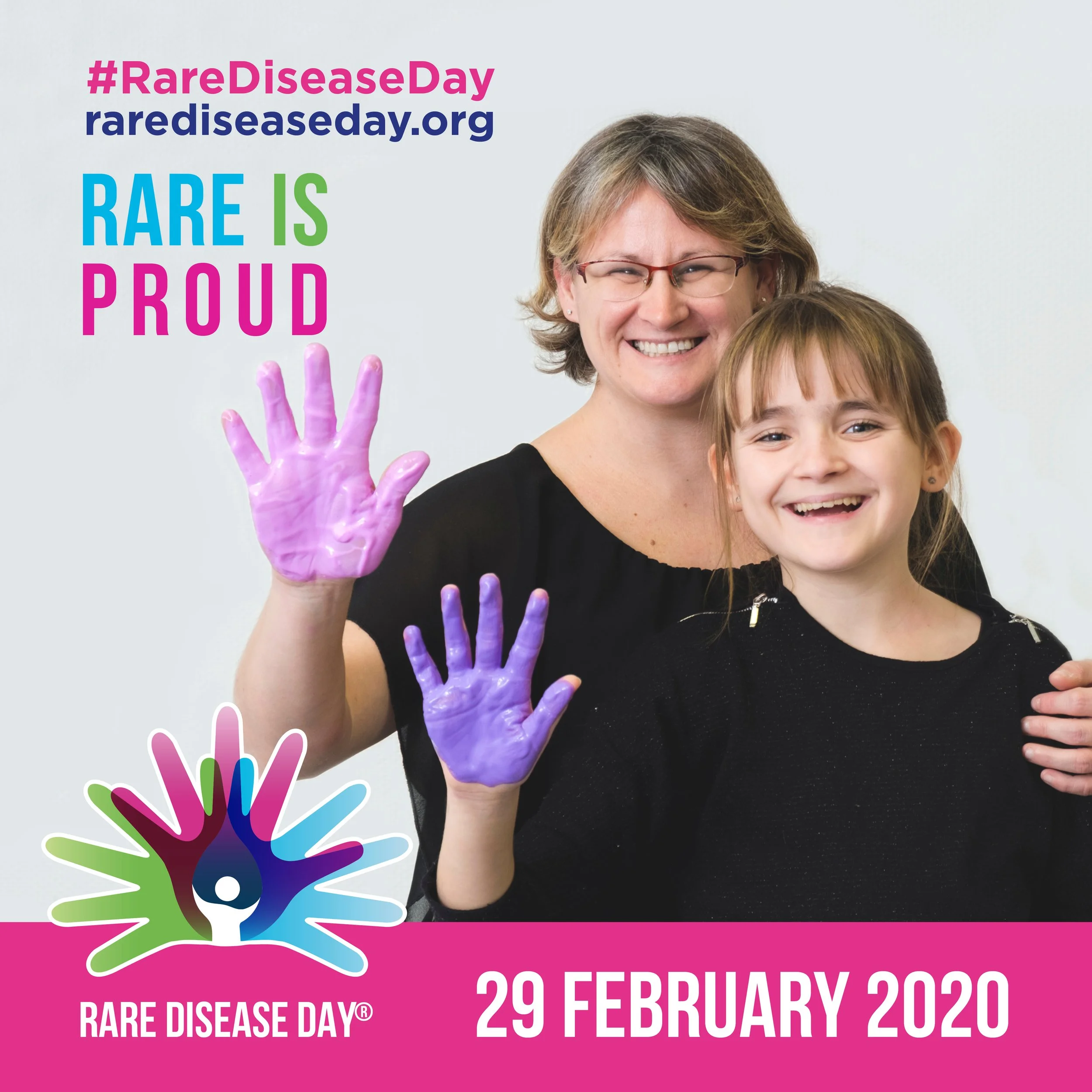 A woman with glasses and a young girl smiling, promoting Rare Disease Day on February 29, 2020, with colorful hands and text celebrating the rare disease awareness event.