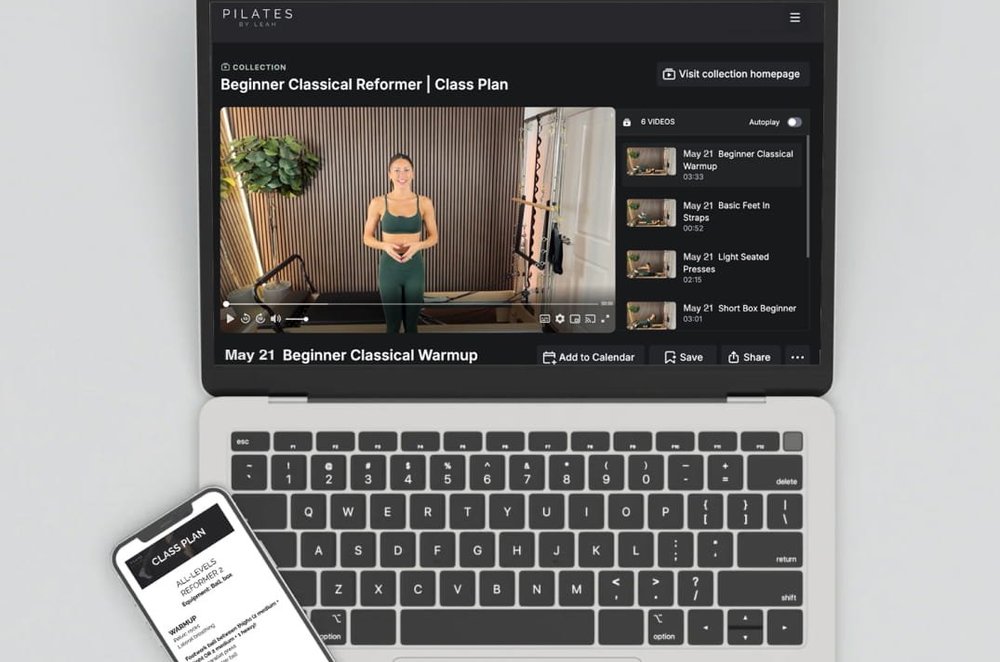 A written Pilates class plan open on a laptop and phone