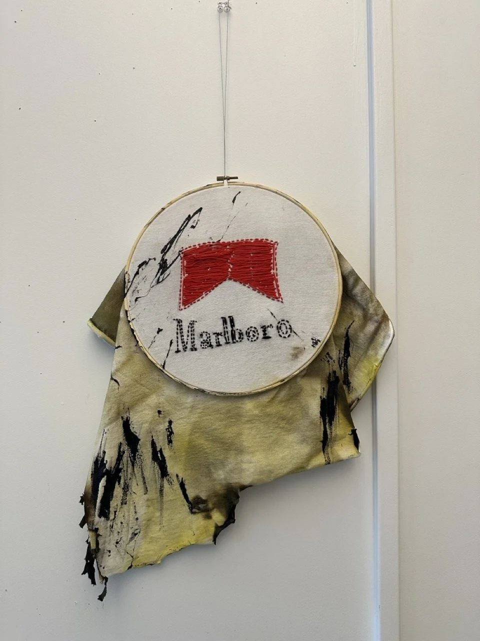 Cigarette Embroidery - 2025 - Fabric, embroidery thread, spray paint, acrylic paint