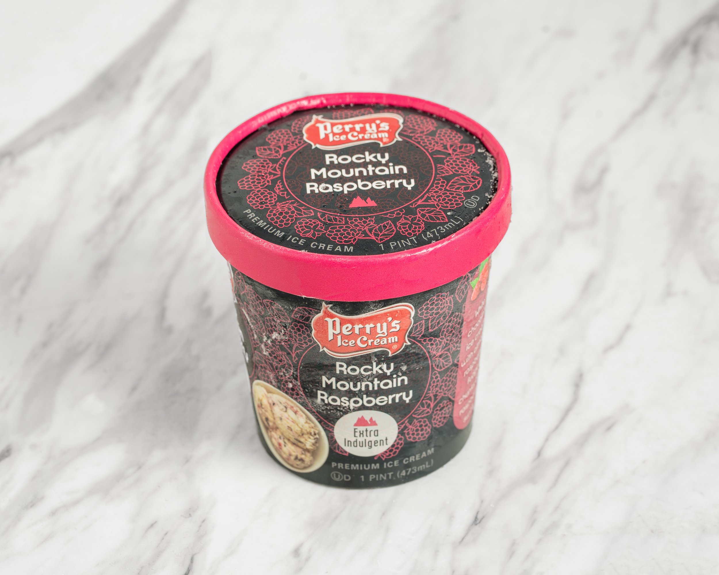 A pint container of Perry's Ice Cream Rocky Mountain Raspberry flavor,  Best Ice Cream in Rochester NY!