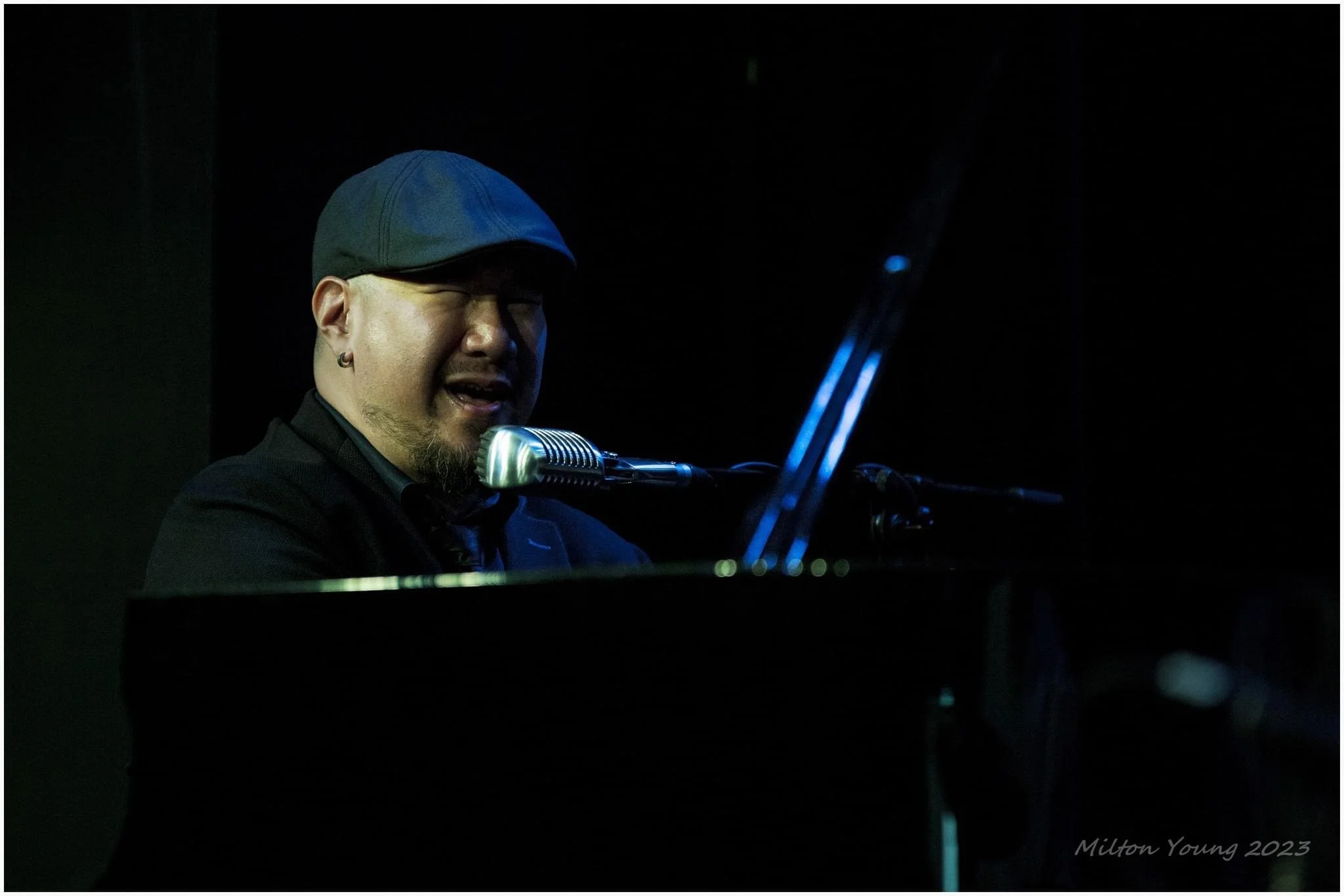 Stan Chang That Piano Player performing live on a piano