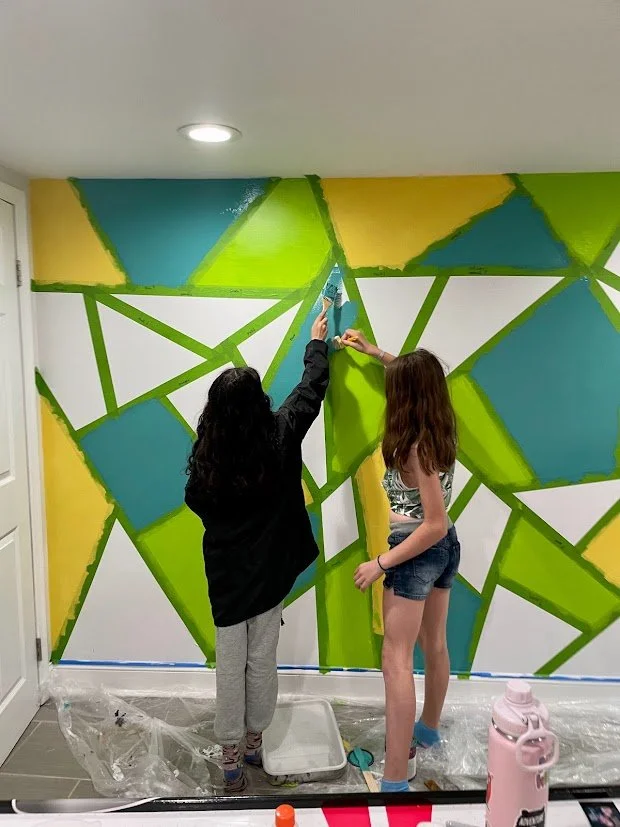 The children were involved in the painting as well. 