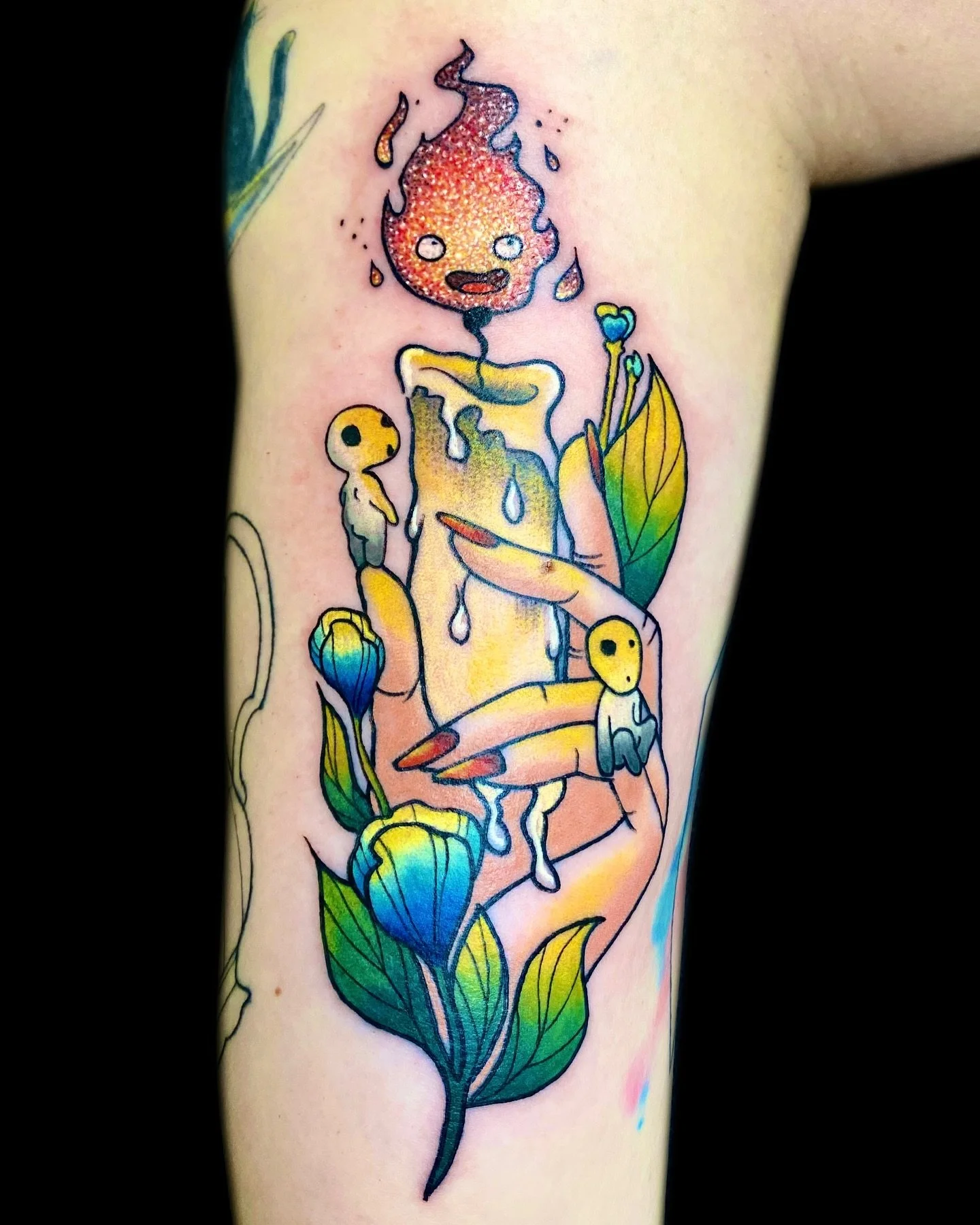 Who is the most popular Ghibli fire 🔥 demon? We all know him, #calcifer 
Thank you Lily ❤️ 

#glittertattoo #pdxtattoo #animetattoos #oregontattoo #ghiblitattoo #pdxtattoos #studioghiblitattoo #glittertattoos #glitter #ghiblistudio