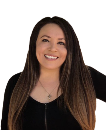 A woman with long brown hair smiling, wearing a black top and a cross necklace.
