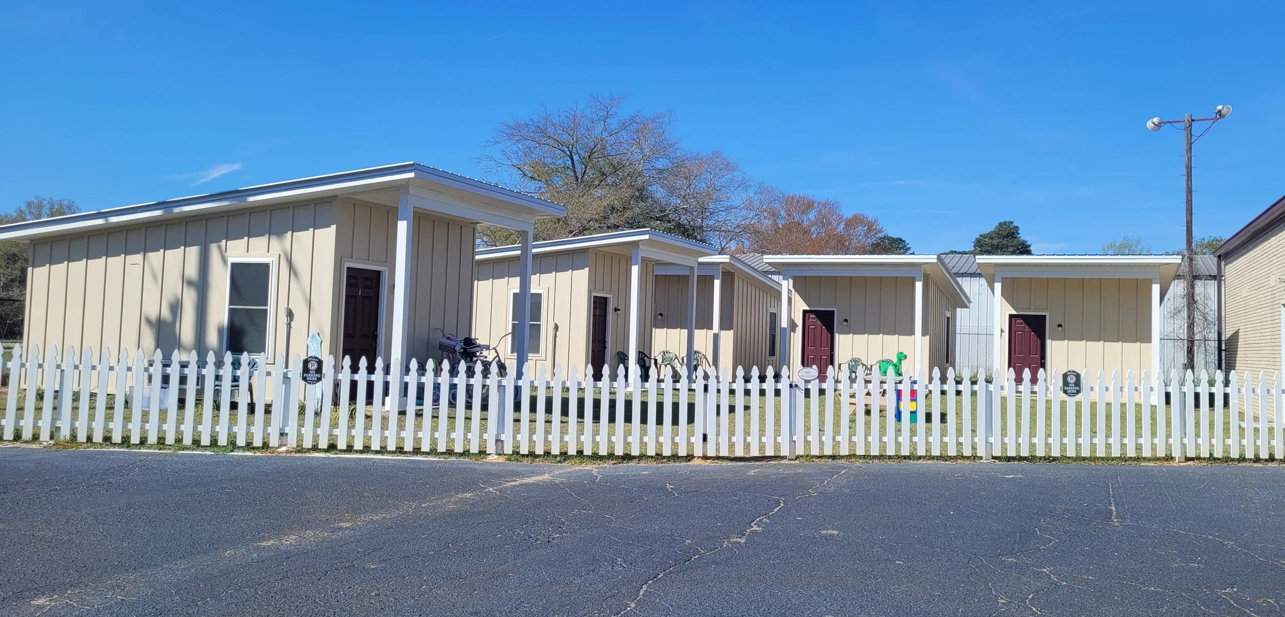 5 Tiny Transistional houses for mom_s and kids behind main building.jpg