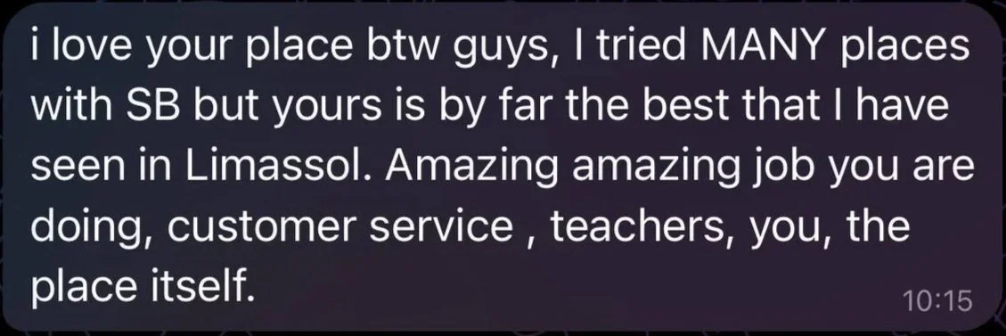 A text message praising a place and its staff, with compliments on customer service and job performance, mentioning Limassol and a service provider