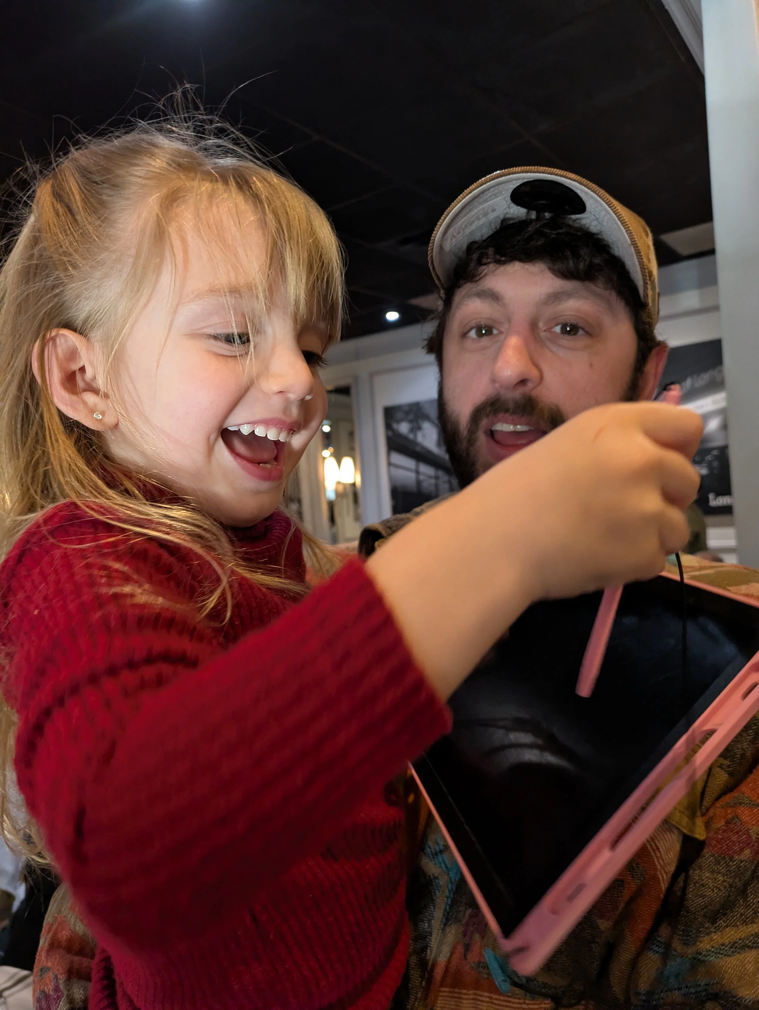 Our niece showing her artwork