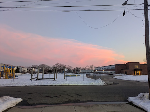 The public playground across from our driveway with a beautiful sunset