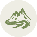 Green mountain with a winding road in front of it, circular logo style