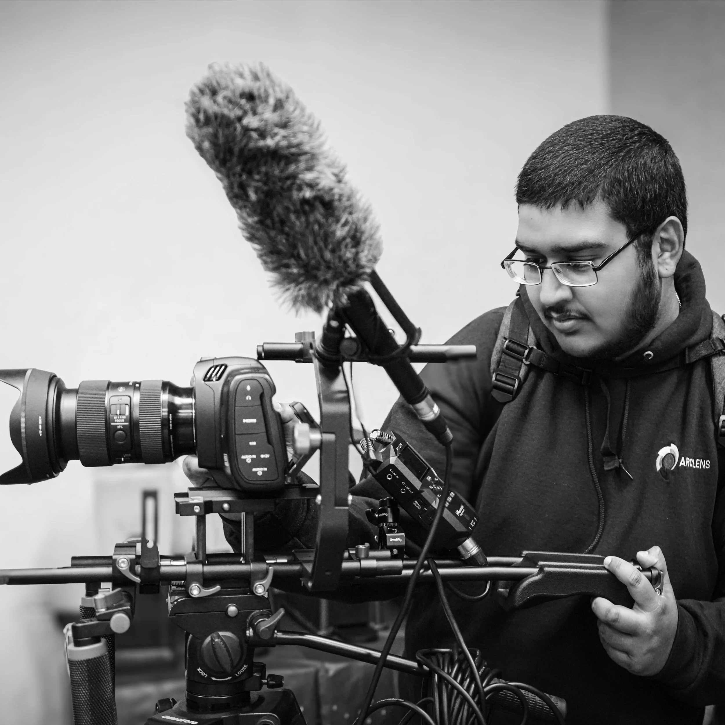 Gurdil Dardi, film director and producer, operating a professional cinema camera on set
