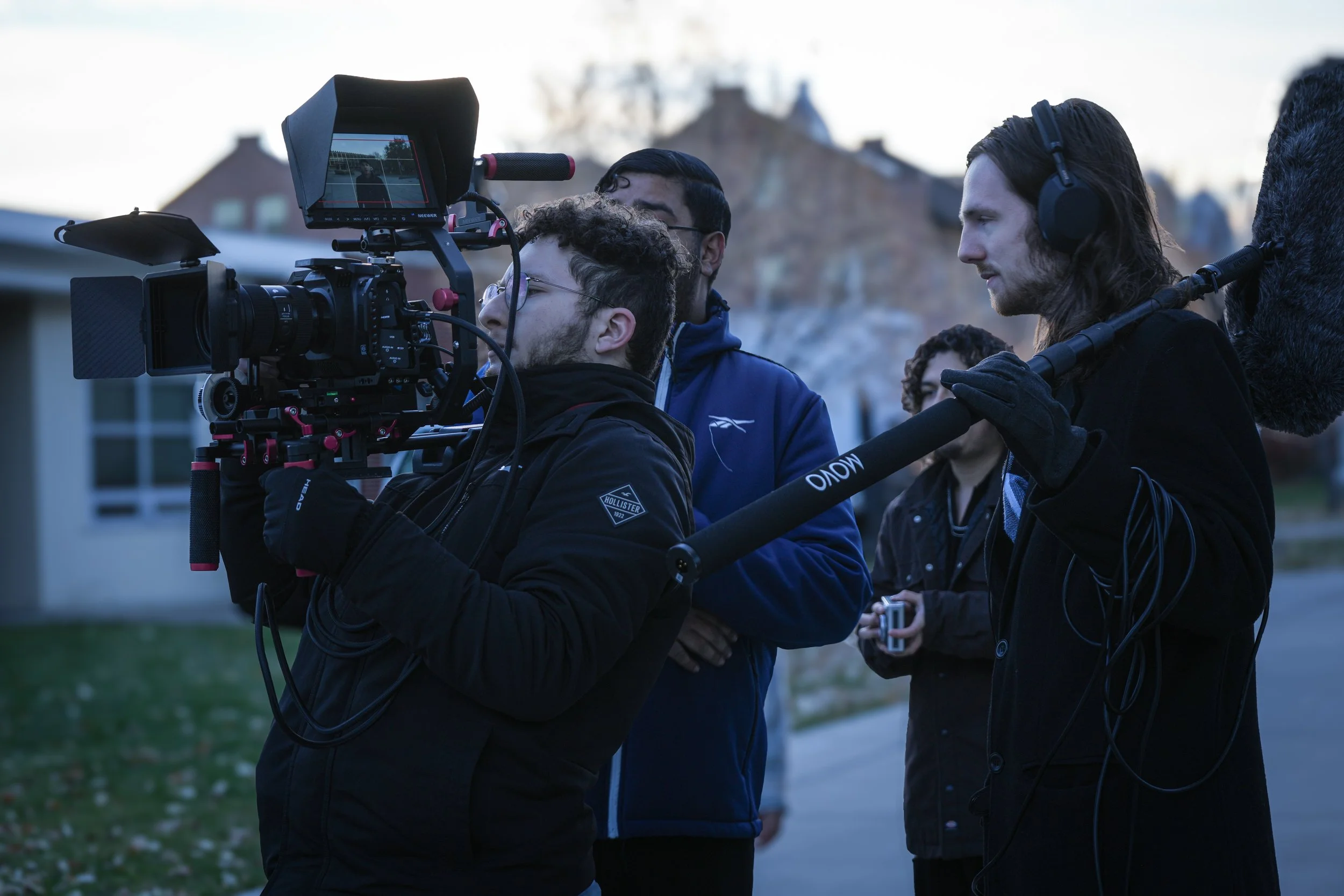 Gurdil Dardi, film director and producer, working with crew on set during production
