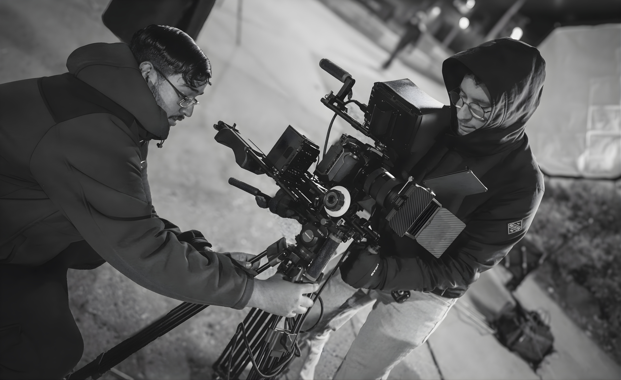 Gurdil Dardi, film director, working with crew on a professional film set at night