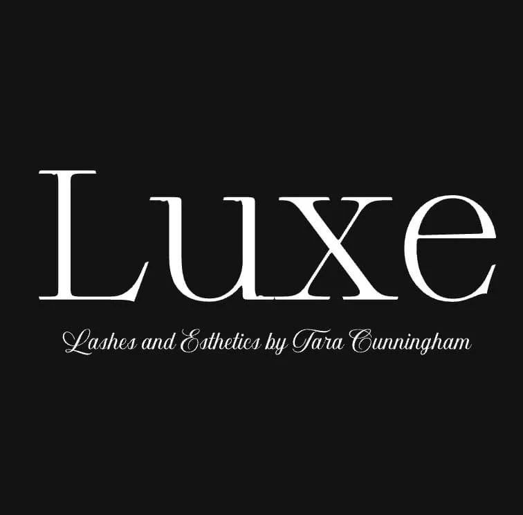 Black background with white text that reads "Luxe" with a smaller script below stating "Lashes and Esthetics by Tara Cunningham."