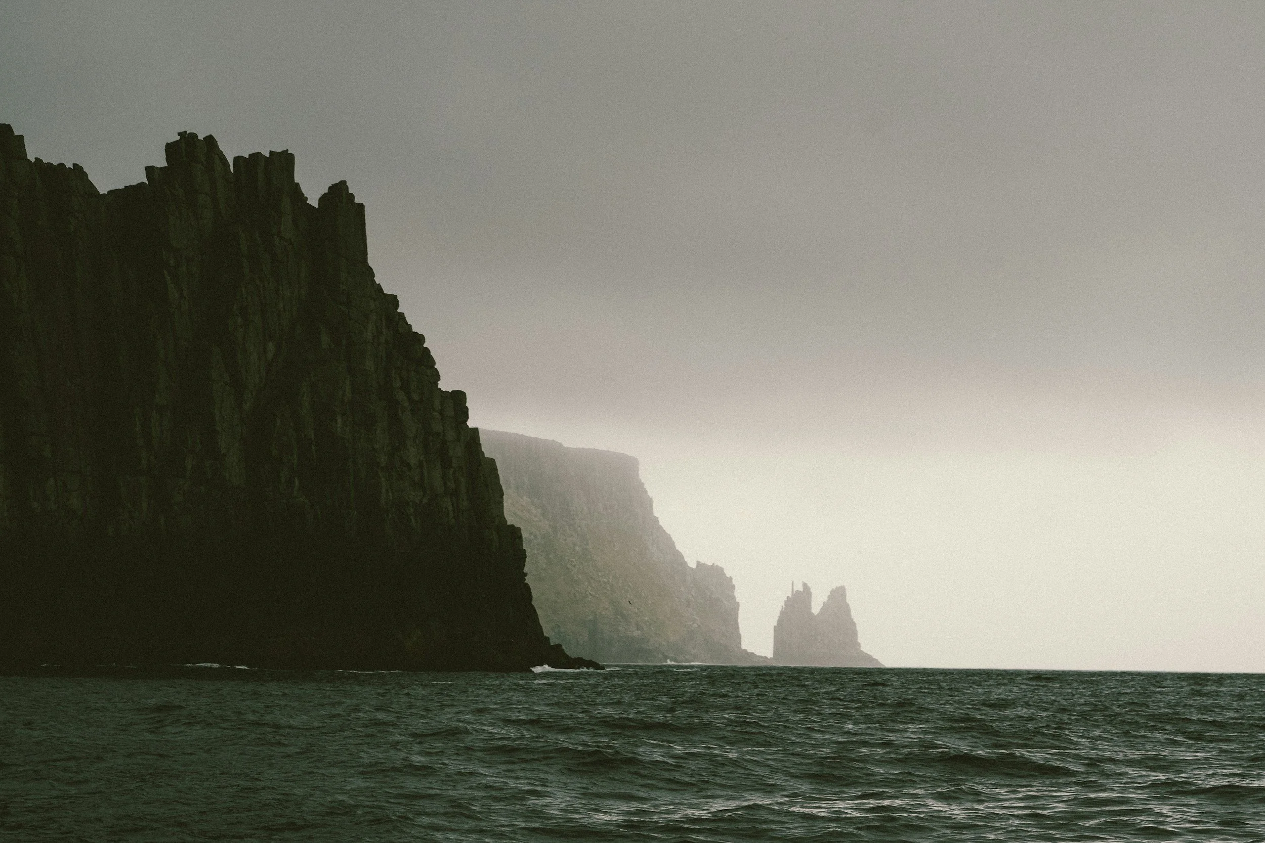 Cinematic coastal landscape captured through aerial cinematography for commercial video production