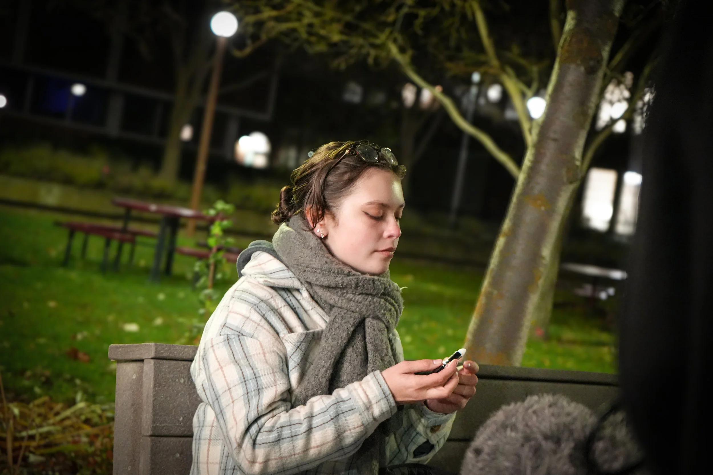 Narrative film scene featuring actress during nighttime cinematic production by ARC Lens Productions