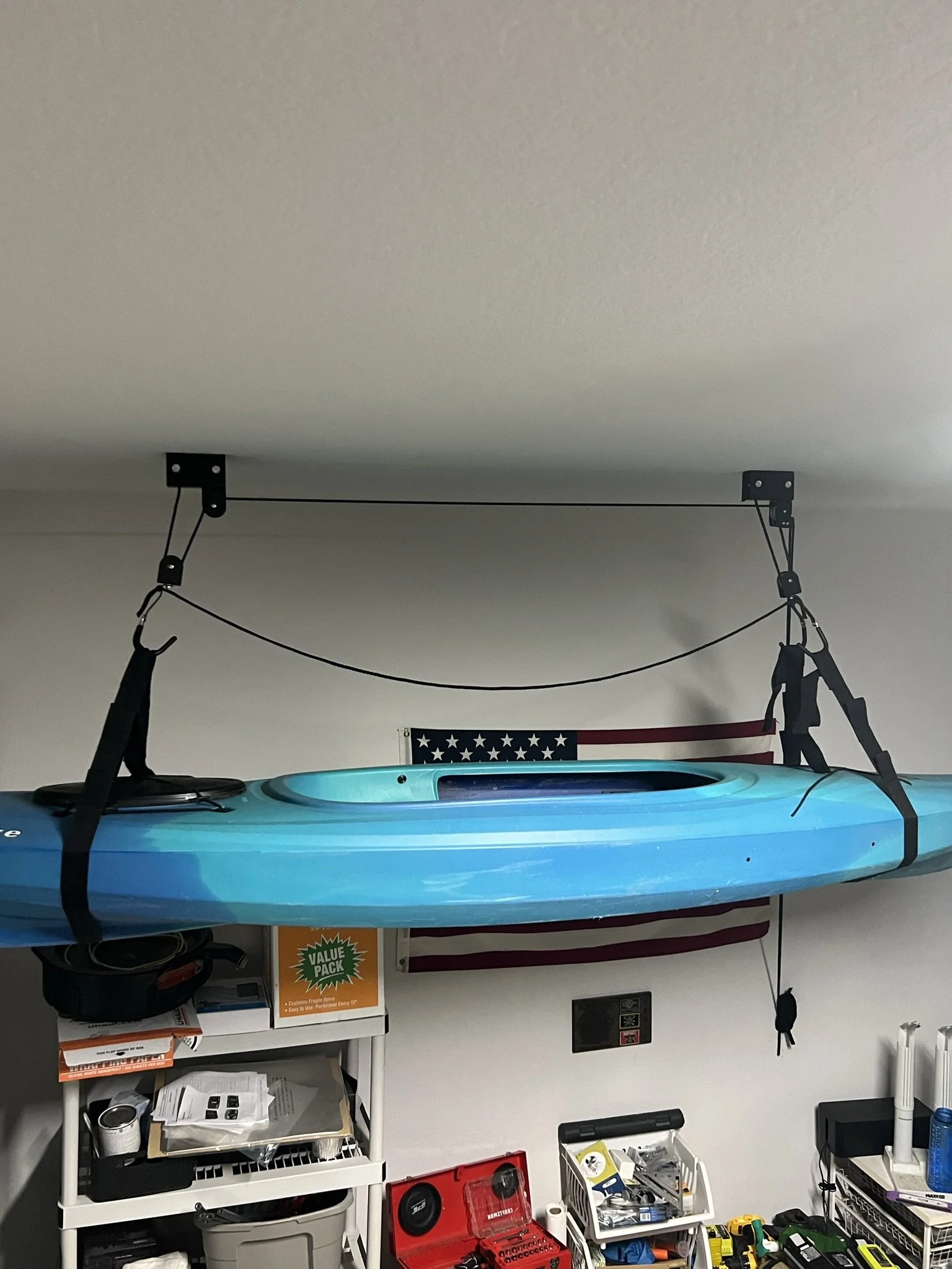 Garage kayak storage pulley system install