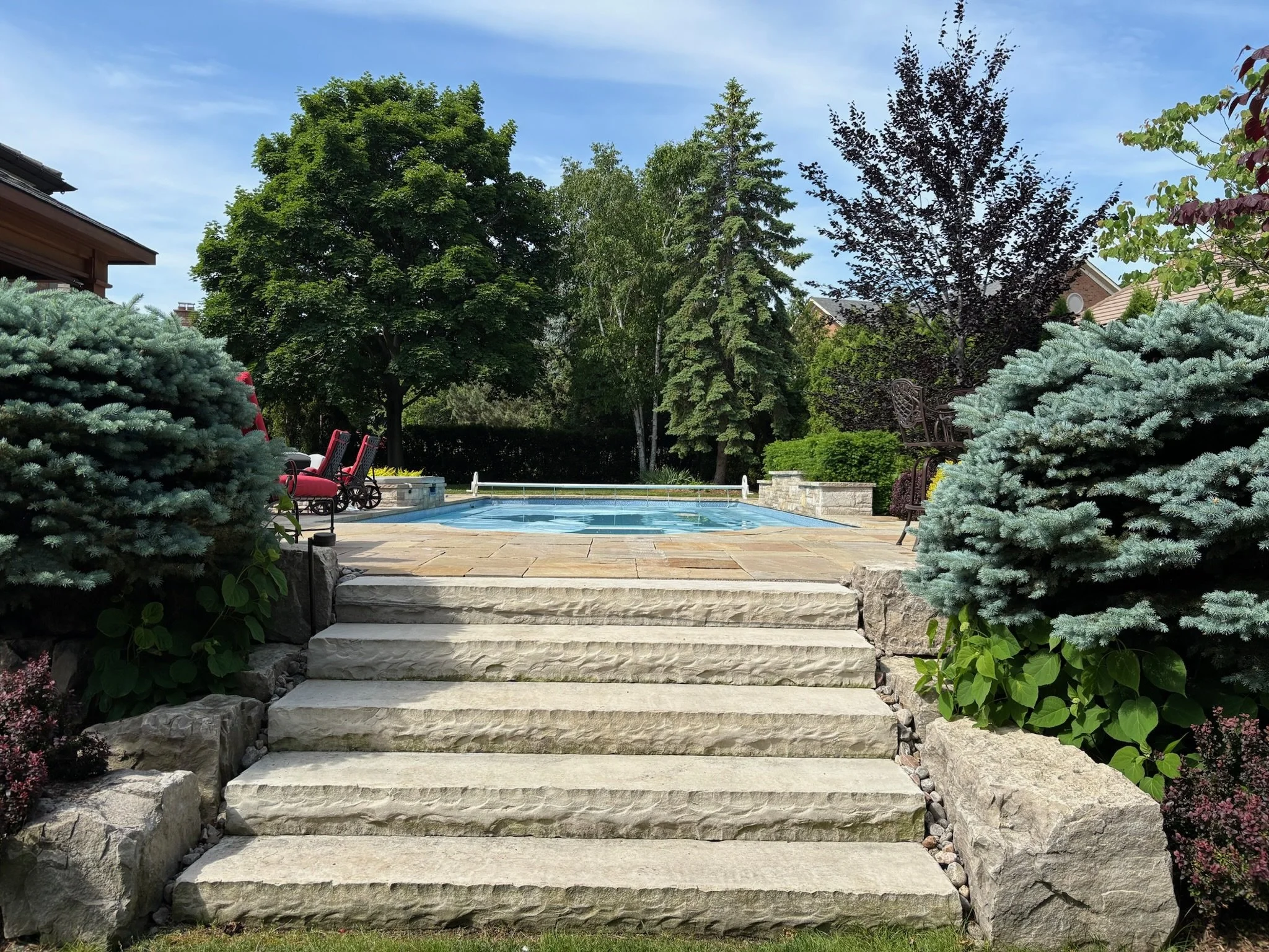 outdoor stone steps to pool.jpeg