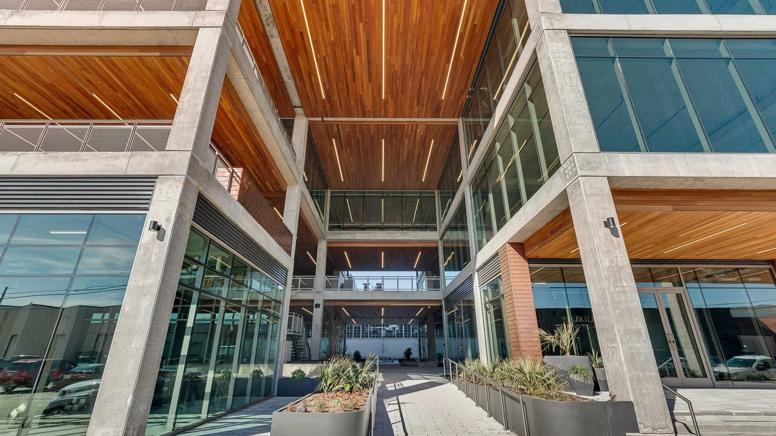 04+Steet+Wood+Glass+Concrete+Entrance+Courtyard+Foyer.jpg