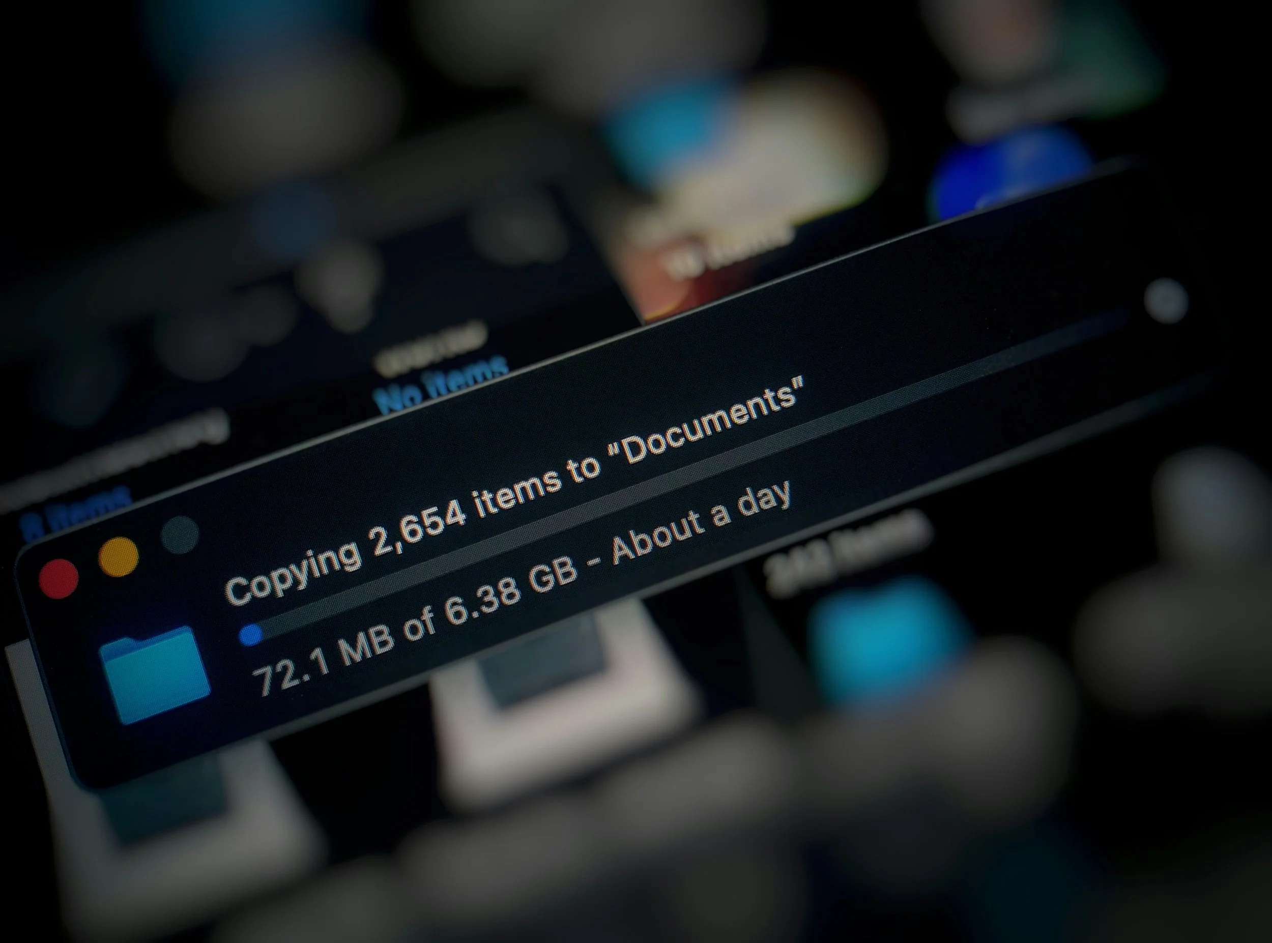 Computer screen showing a file transfer from 'Items' to 'Documents,' transferring 2,654 items, with 72.1 MB of 6.38 GB copied.