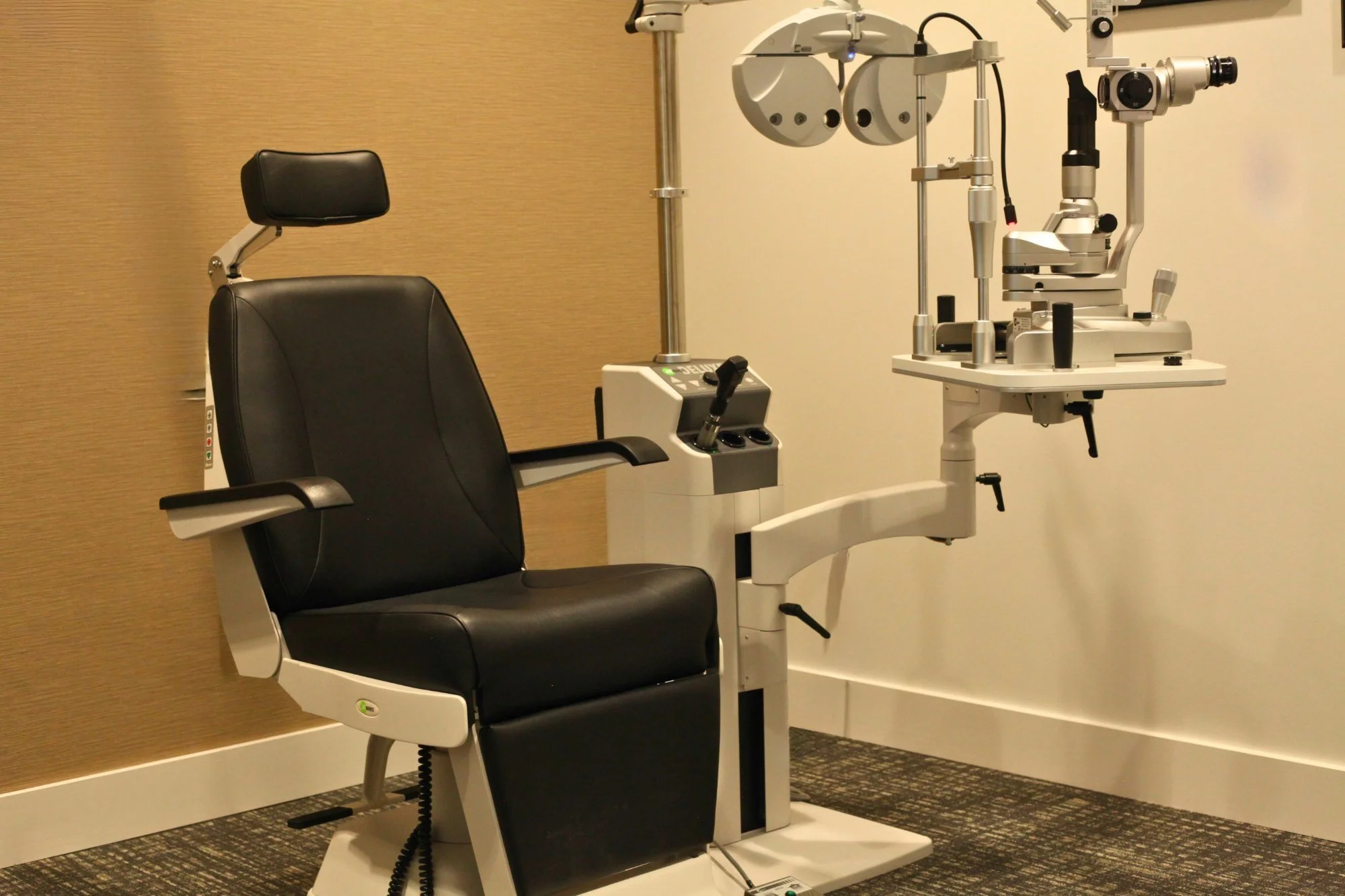Comprehensive eye exam chair and phoropter at Hoffman Eyecare in Westfield, IN