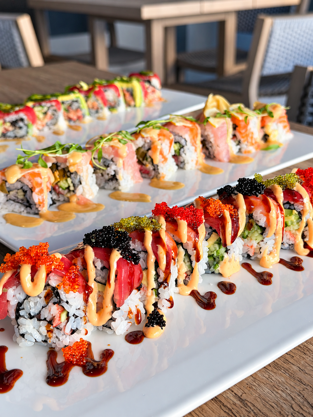 Vibrant Sushi Roll Platter on a Patio Table.png