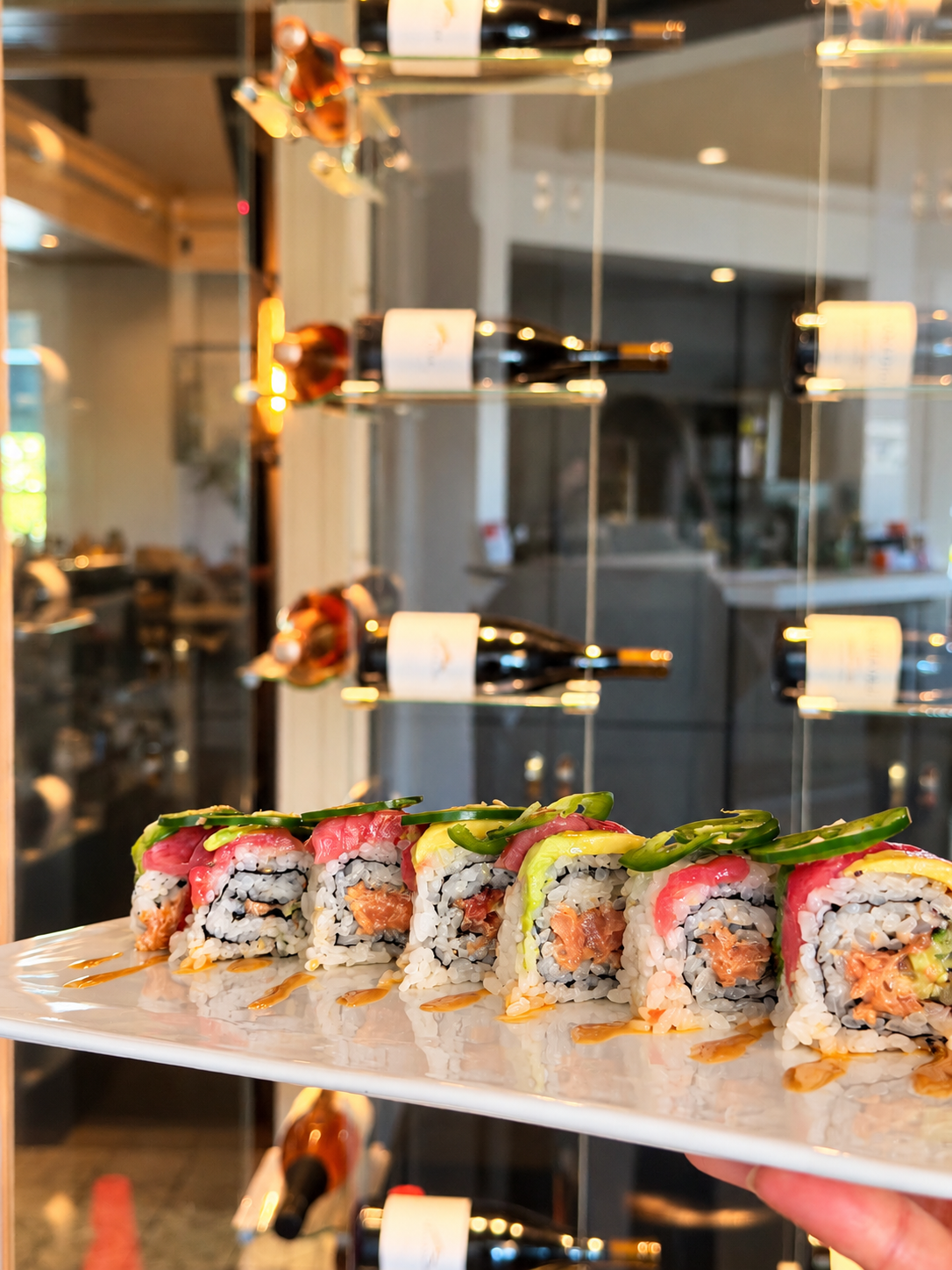 Vibrant Sushi Platter with Wine Display.png