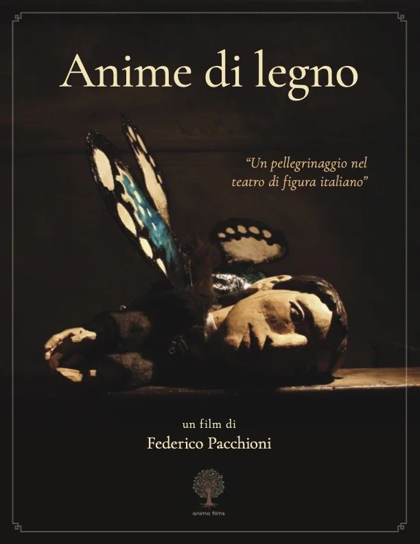 Movie poster for 'Anime di legno,' a film by Federico Pacchioni, featuring a puppet or sculpture of a person's head with butterfly wings attached, against a dark background.