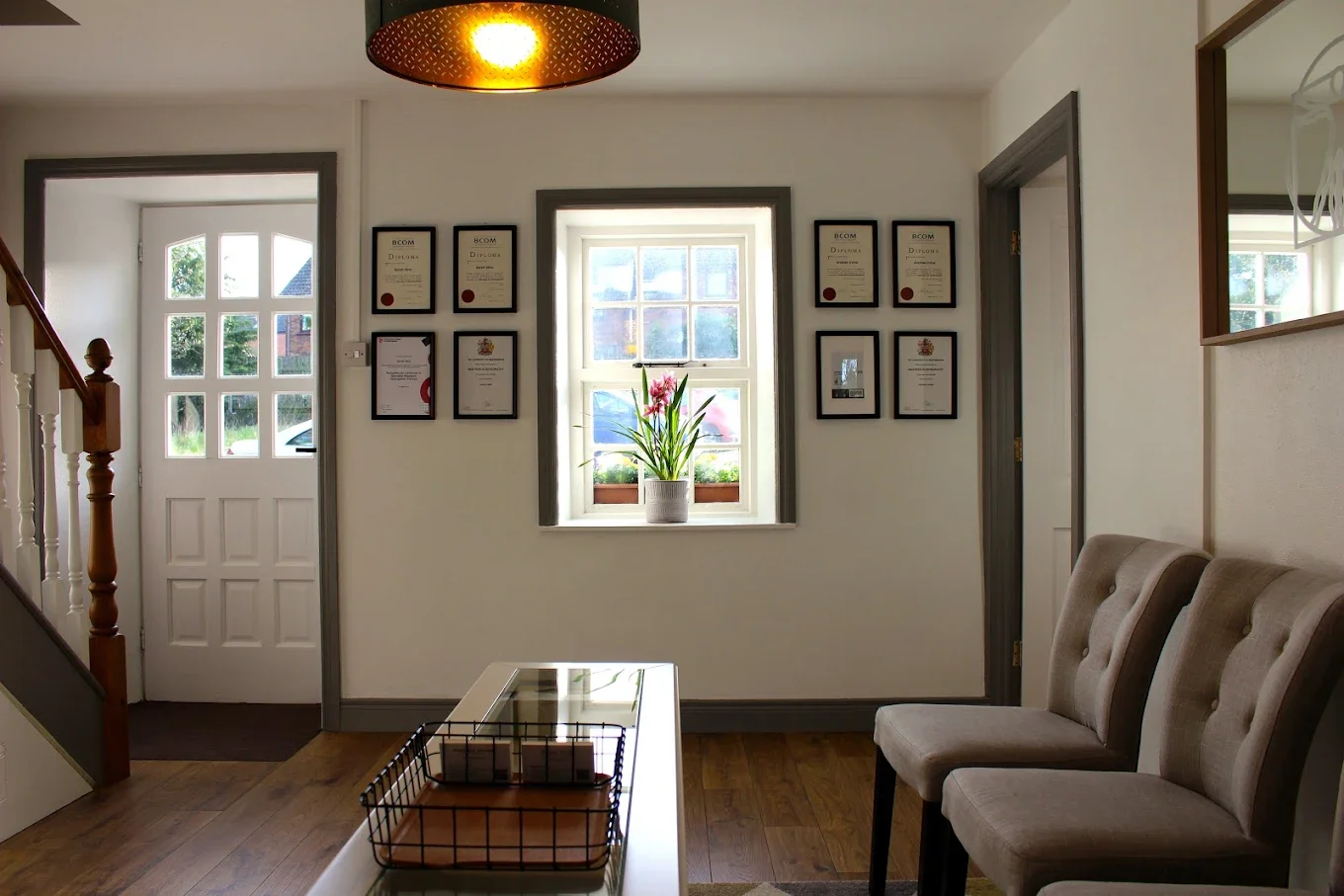 Our warm and comfortable waiting room. There are tea, coffee and magazines available both before and following sessions. It is a private space within Moira Counselling Practice.
