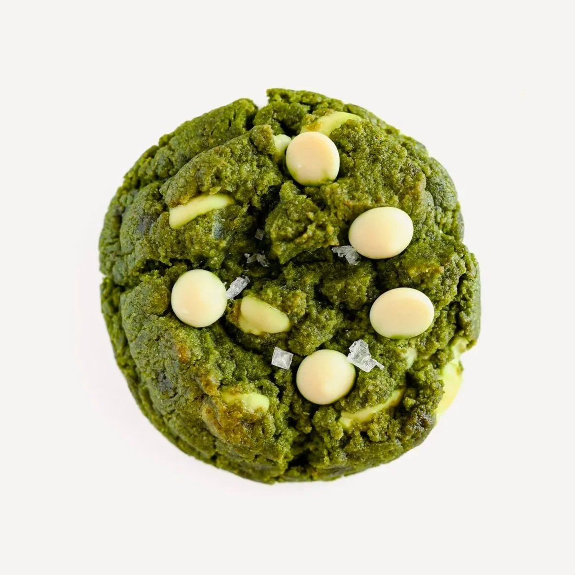 Matcha white chocolate cookie topped with white chocolate and a light sprinkle of flaky sea salt.