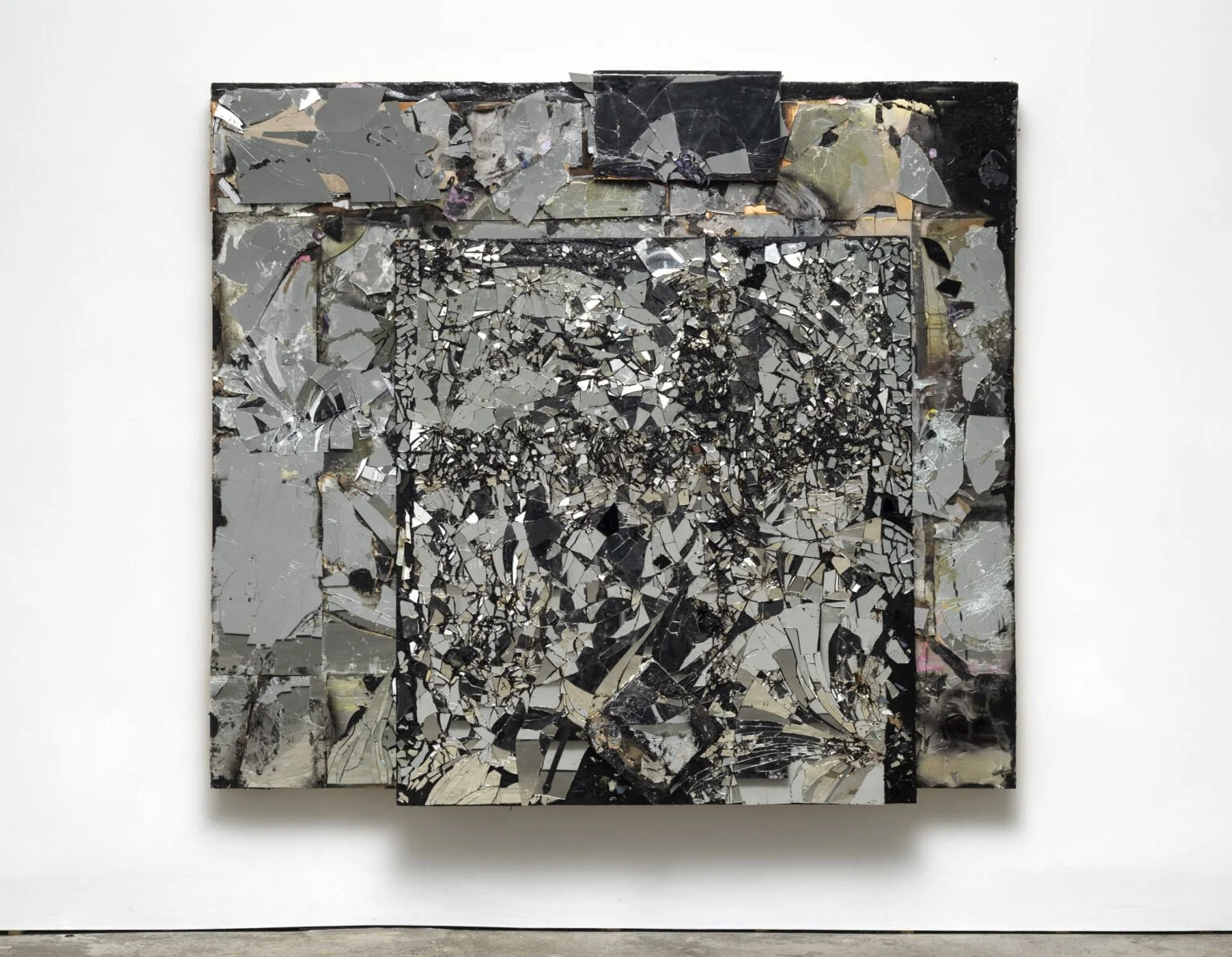 Untitled 9, 2022-2025, Mirrored glass, tar, resin, silicone, and oil paint on wooden panels, 74.5 x 86.5 x 6 inches