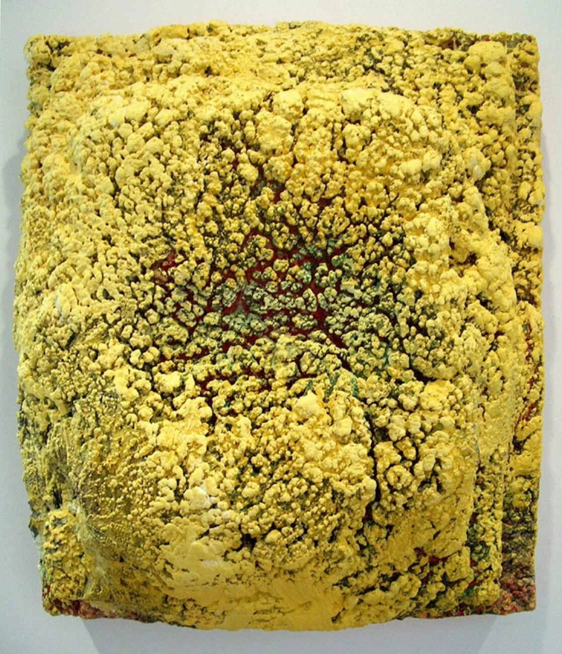 Chorten with Yellow and Red Sunflower, 2001, Oil and wax on wood, 30 x 26 x 10 inches