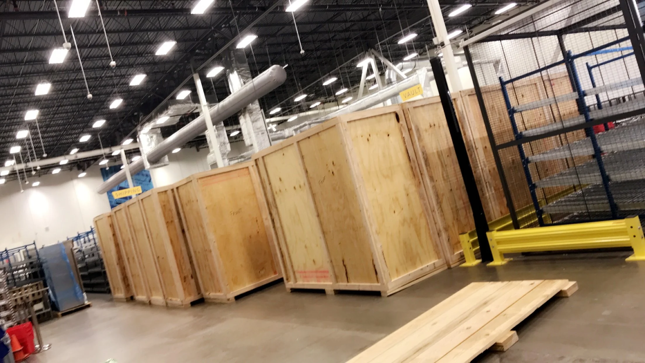 Multiple custom wooden crates built for shipment, designed for durability and efficient handling.