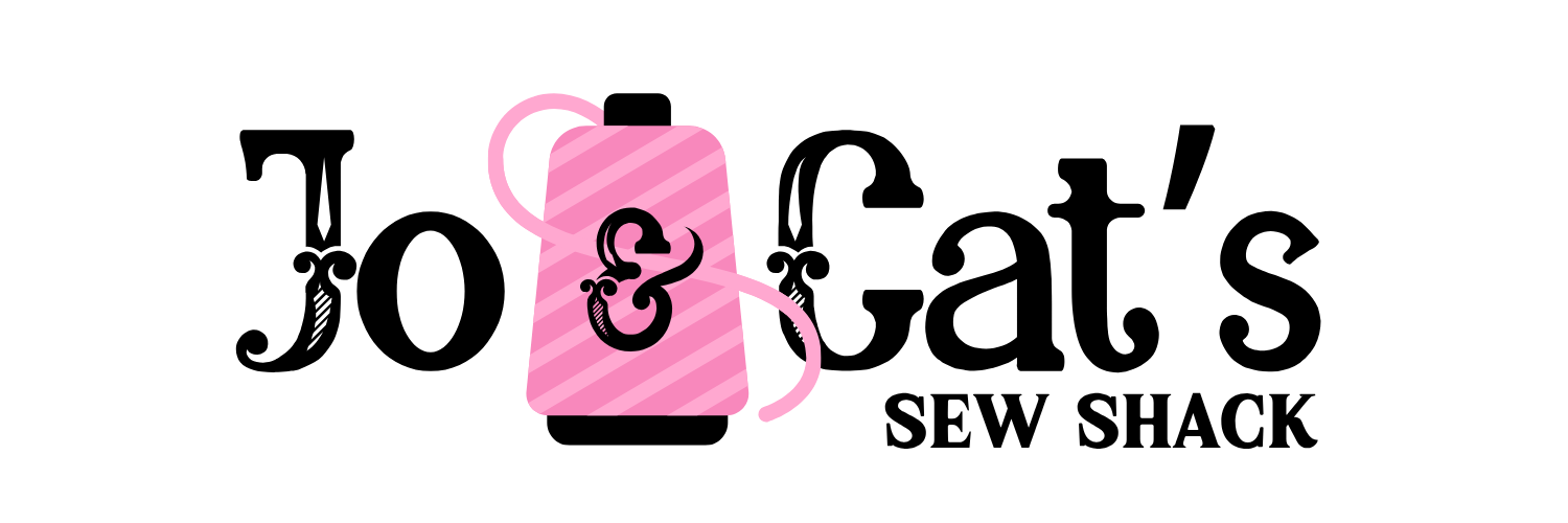 Pink gift tag with black ampersand symbol decorated with pink striped pattern.