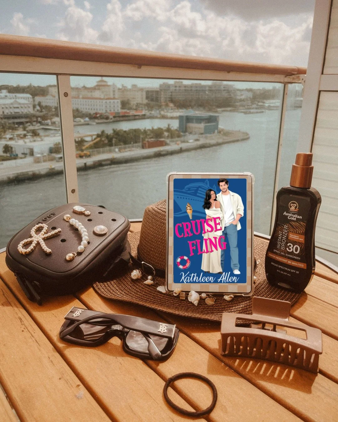Always great to get pictures from readers reading your book while they're on a cruise! A digital tablet displaying a book cover titled "Cruise Fling" by Kathleen Allen, featuring an illustration of a couple and a cruise ship.