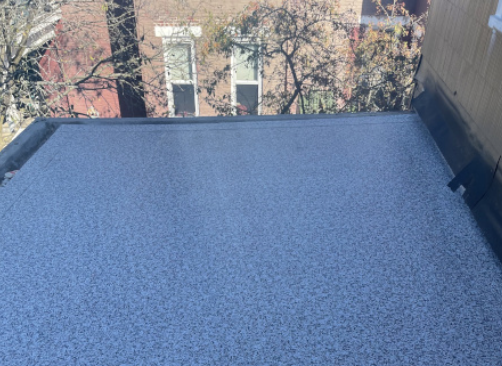New flat roofing surface on a residential building