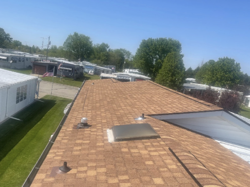 Asphalt shingle roof with vents and a skylight