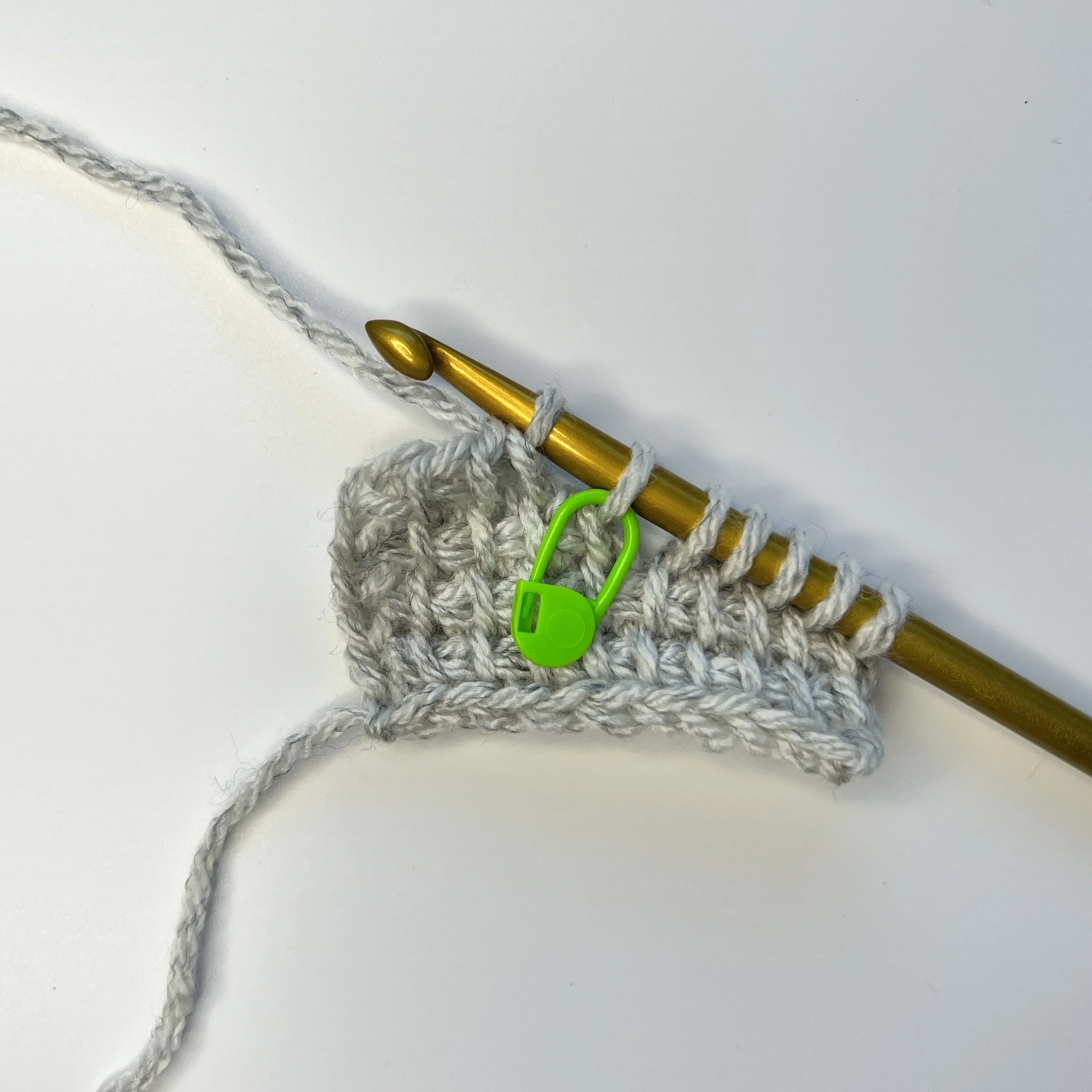 RP: Ch 1, *yarn over, pull through 2 loops* until you reach the marked st.