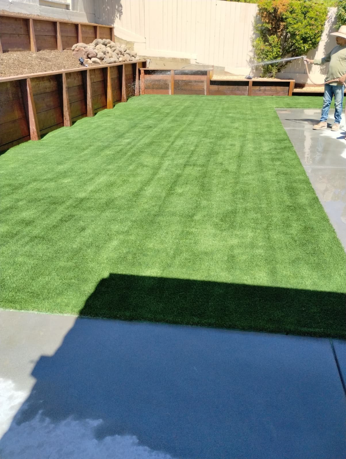 Turf Installation And Wood Retaining Wall
