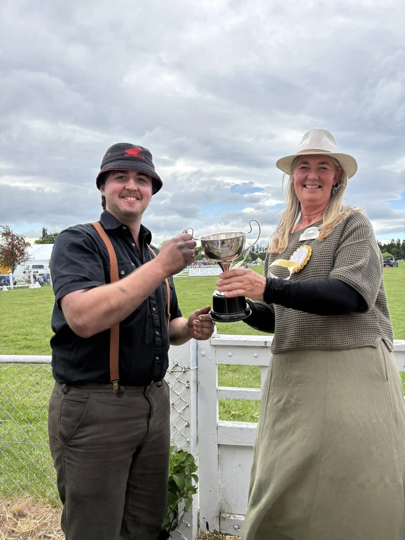 President Tracey McIlraith 2025 and winner of a trophy.