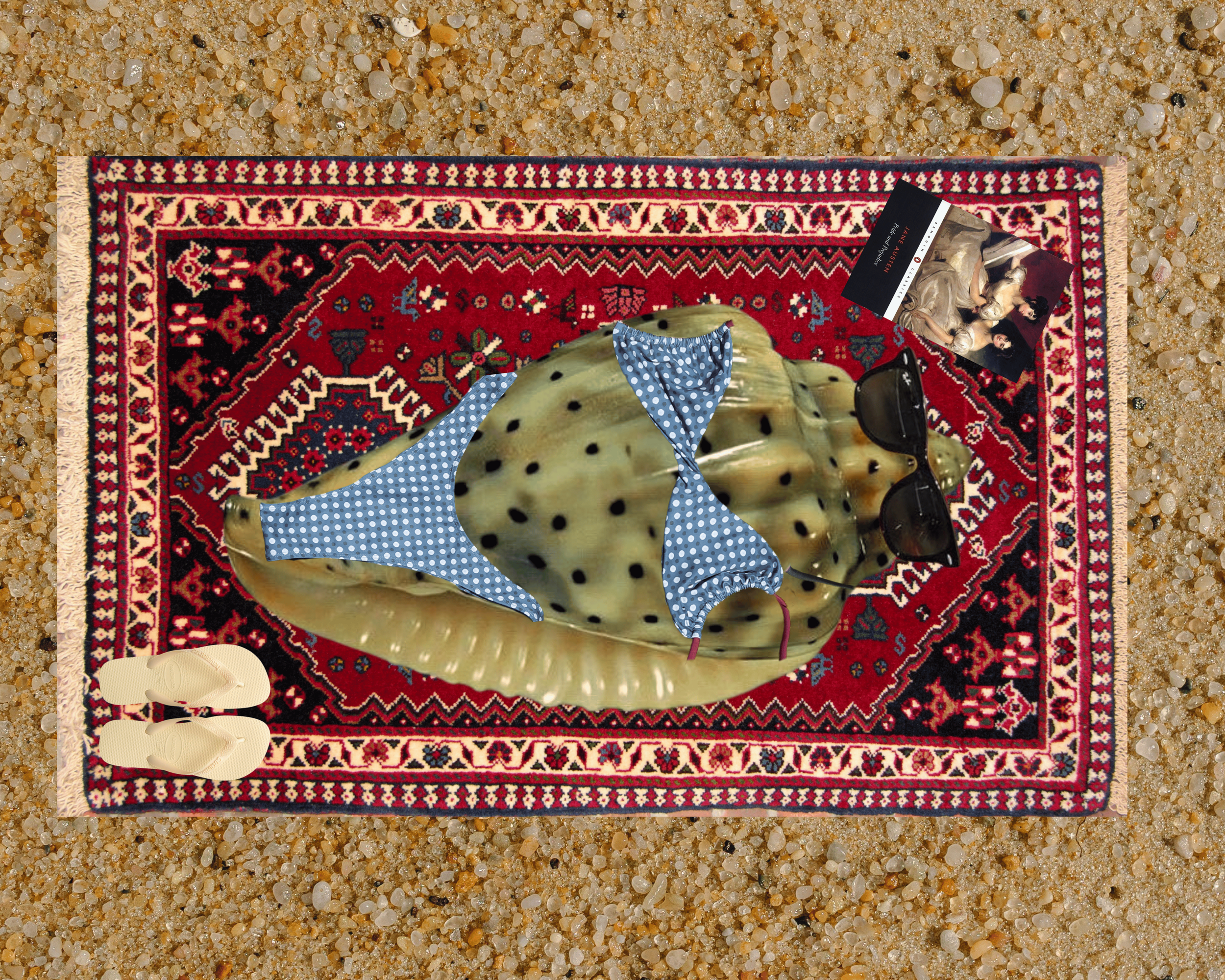 A colorful patterned rug on a sandy surface with sunglasses, a book with a woman on the cover, a piece of blue cloth with white polka dots, a pair of beige slip-on shoes, and a mascot or figure resembling a green chameleon with black spots.