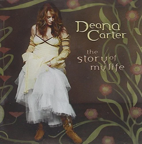 Book cover featuring Deana Carter, titled 'The Story of My Life', with a woman in a white dress and brown boots standing against a floral background.