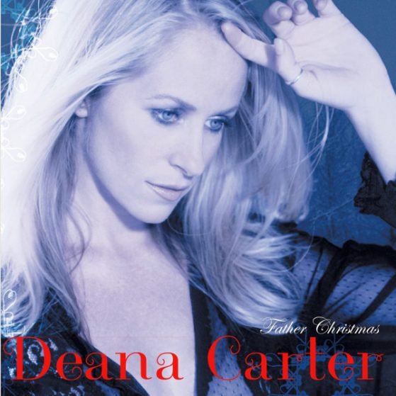Close-up photo of a woman with long blonde hair, gray eyes, and fair skin touching her hair, wearing a black top. Overlayed text reads 'Deana Carter' and 'Father Christmas'.