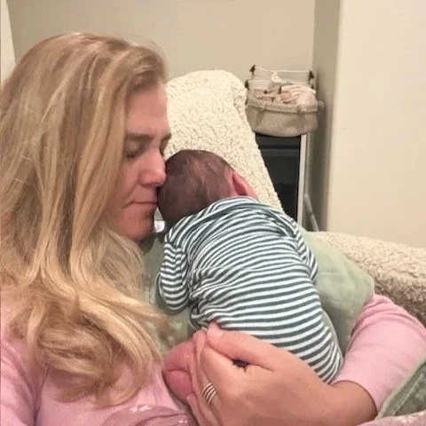postpartum doula San Diego comforting newborn and supporting mother
