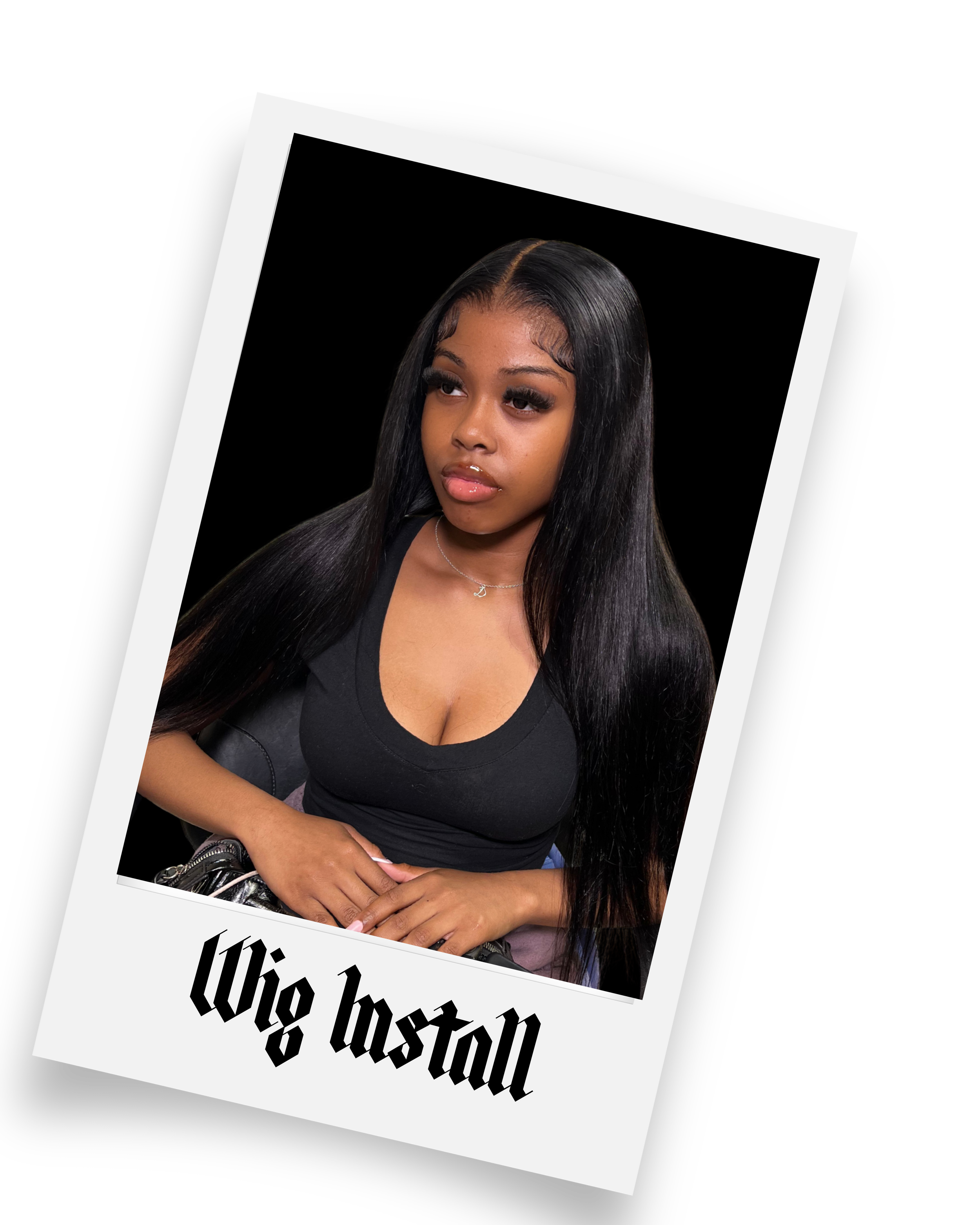 A young woman with long black hair and wearing a black top, sitting against a black background, framed as a Polaroid with the text "Wig willall" at the bottom.